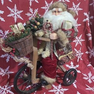 Santa 18" on a vintage-style Wooden Triycle Christmas collectible figurine.